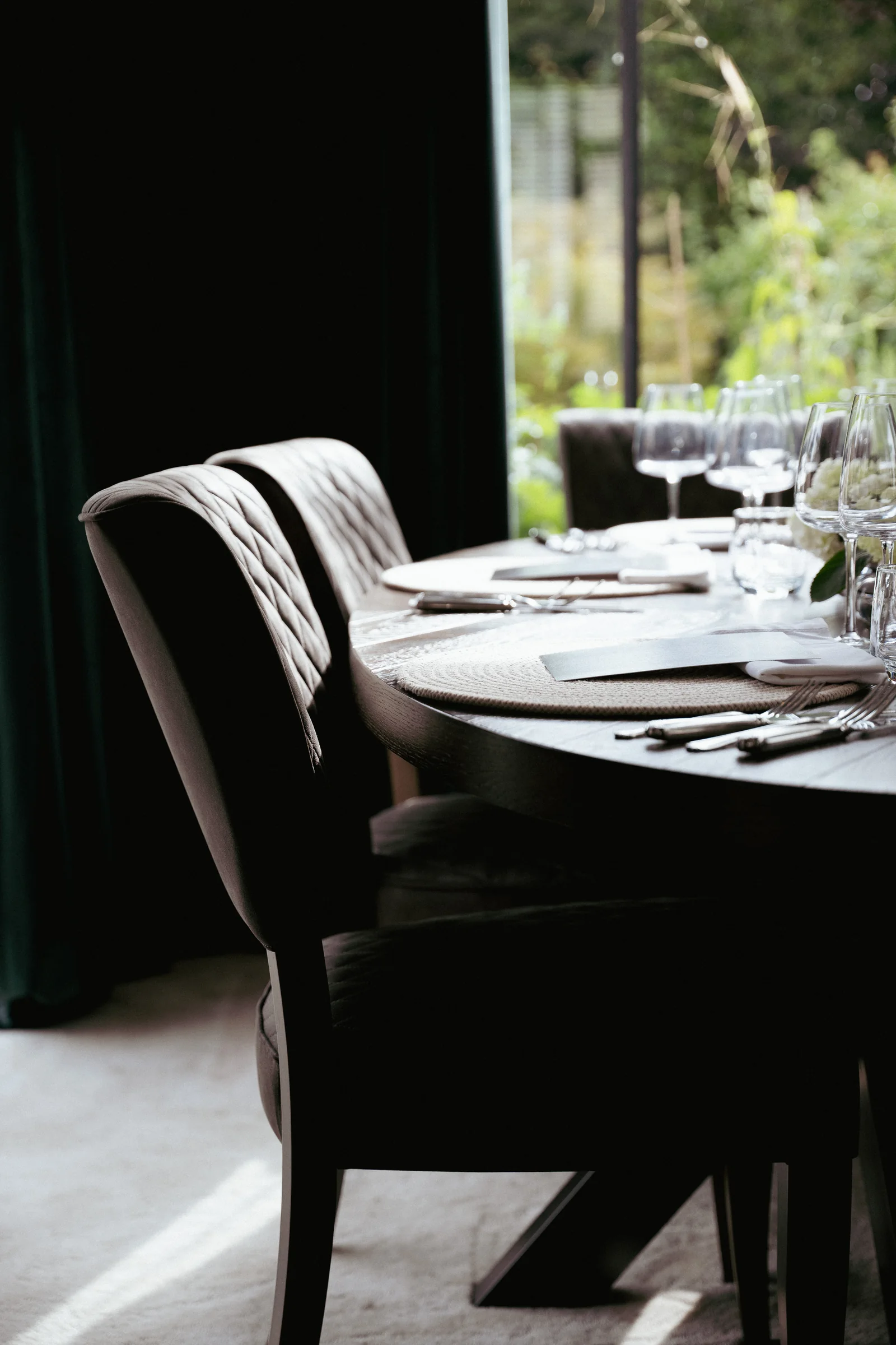 Candlelit private dining table prepared for guests